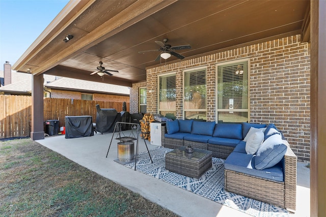 view of patio / terrace featuring an outdoor living space and ceiling fan