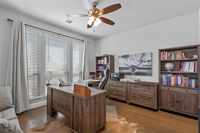 office space with wood-type flooring and ceiling fan