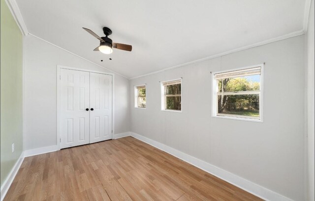 bathroom featuring vanity, a textured ceiling, walk in shower, and crown molding