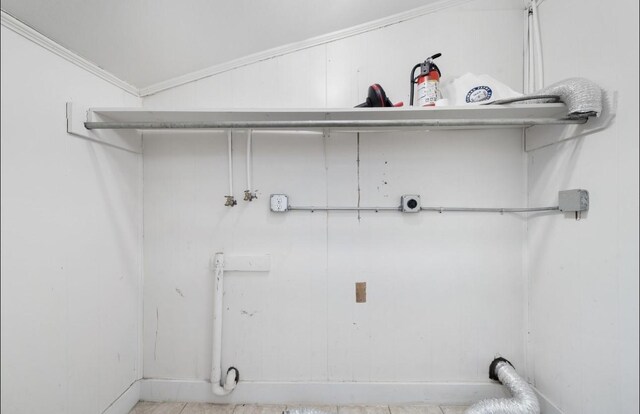 unfurnished bedroom featuring multiple windows, ceiling fan, a closet, and vaulted ceiling