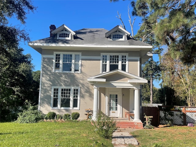 view of front of house with a front lawn