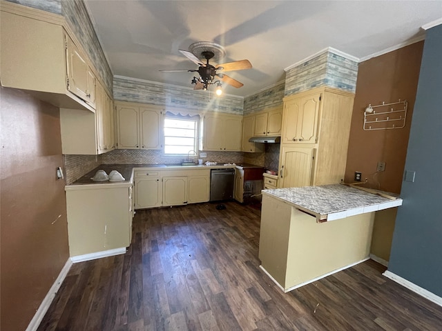 kitchen with dishwasher, dark wood-type flooring, crown molding, ceiling fan, and kitchen peninsula