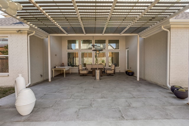 view of patio / terrace featuring a pergola and an outdoor living space