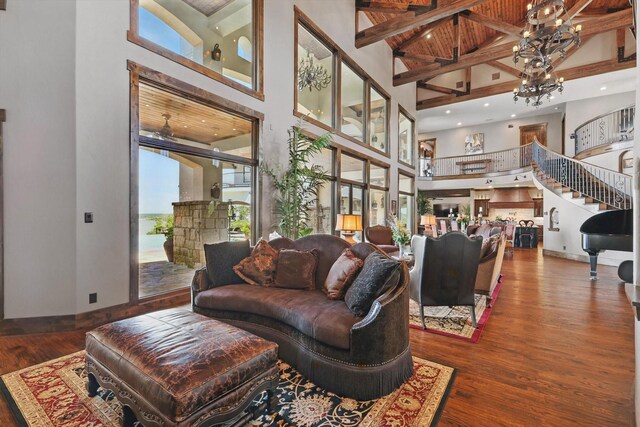 5101 Hells Gate Loop, Possum Kingdom Lake, TX 76475 - dining area featuring wine cooler, dark wood-style floors, a chandelier, lofted ceiling, and bar area