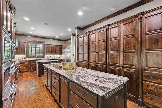 5101 Hells Gate Loop, Possum Kingdom Lake, TX 76475 - dining space with a chandelier, wood finished floors, beamed ceiling, and baseboards