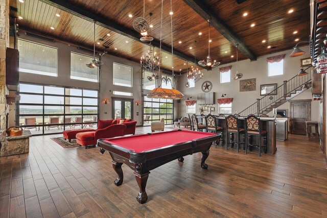 5101 Hells Gate Loop, Possum Kingdom Lake, TX 76475 - bar with a chandelier, a towering ceiling, wooden ceiling, and wood finished floors