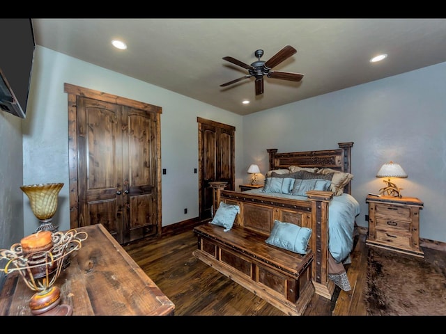 bedroom with dark wood-type flooring and ceiling fan