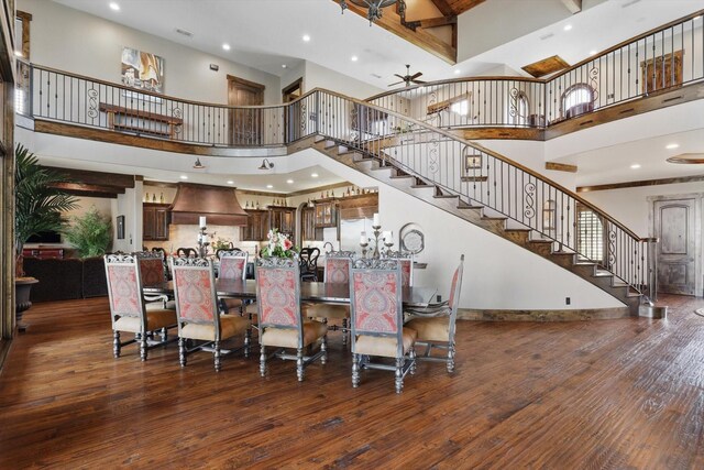 5101 Hells Gate Loop, Possum Kingdom Lake, TX 76475 - kitchen featuring stainless steel built in fridge, arched walkways, a sink, a high ceiling, and a center island with sink