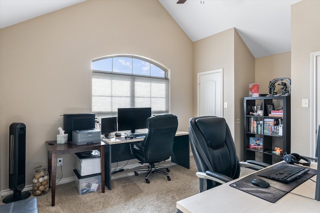 office space with ceiling fan, high vaulted ceiling, and carpet floors