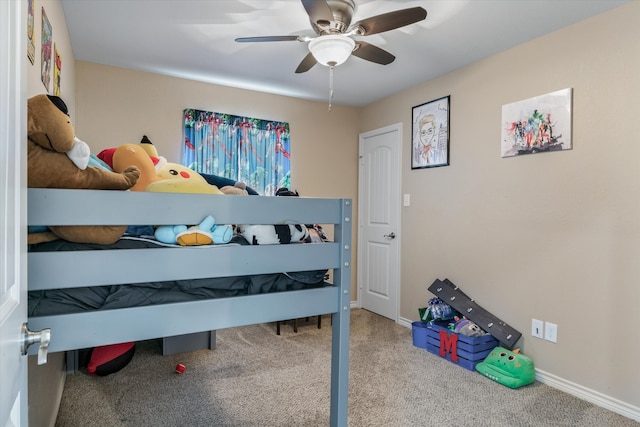 bedroom with ceiling fan and carpet flooring