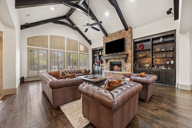 living room featuring beamed ceiling, dark hardwood / wood-style flooring, a fireplace, and high vaulted ceiling