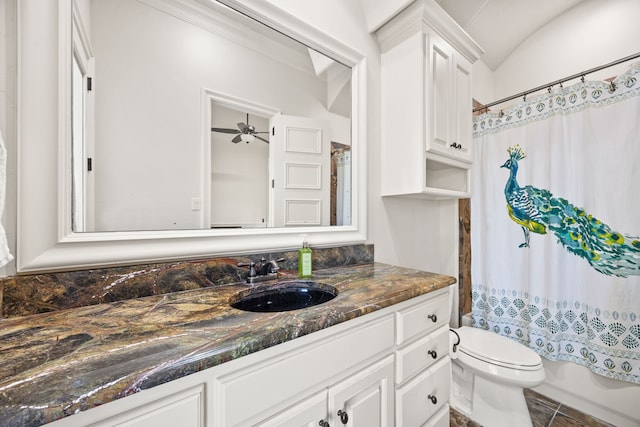 full bathroom with vanity, ceiling fan, shower / bathtub combination with curtain, tile patterned flooring, and toilet