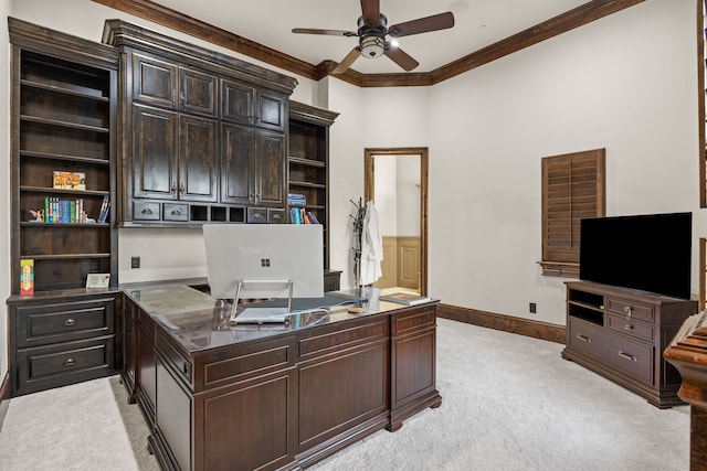 home office featuring crown molding, ceiling fan, and light colored carpet