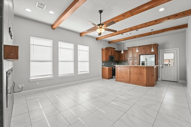 kitchen featuring tasteful backsplash, hanging light fixtures, ceiling fan, stainless steel appliances, and beam ceiling