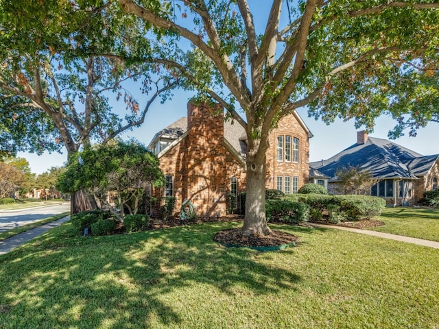 tudor house with a front lawn