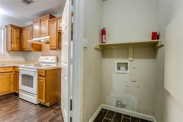 kitchen featuring electric range, crown molding, and dark hardwood / wood-style floors