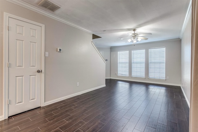 empty room with dark hardwood / wood-style floors, ceiling fan, and crown molding