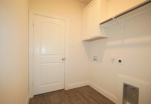 washroom with cabinets, washer hookup, gas dryer hookup, electric dryer hookup, and dark wood-type flooring