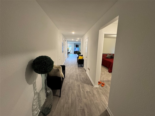 hallway featuring light hardwood / wood-style floors