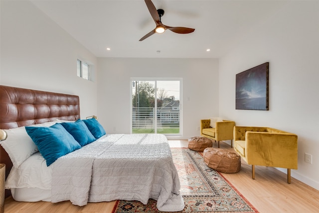 bedroom with ceiling fan and hardwood / wood-style flooring