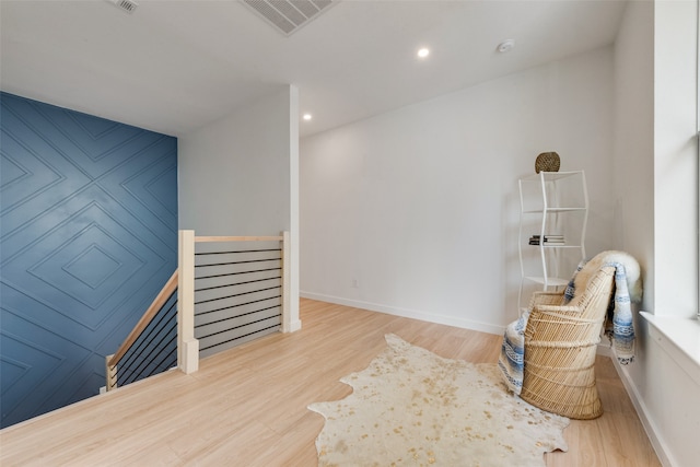 sitting room featuring light wood-type flooring