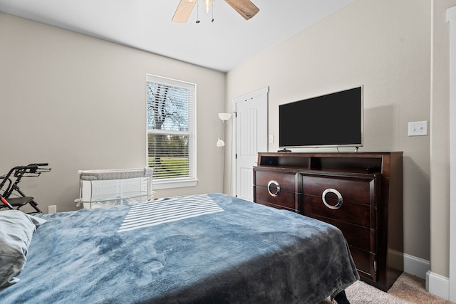 carpeted bedroom featuring ceiling fan