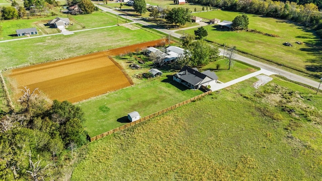 birds eye view of property featuring a rural view