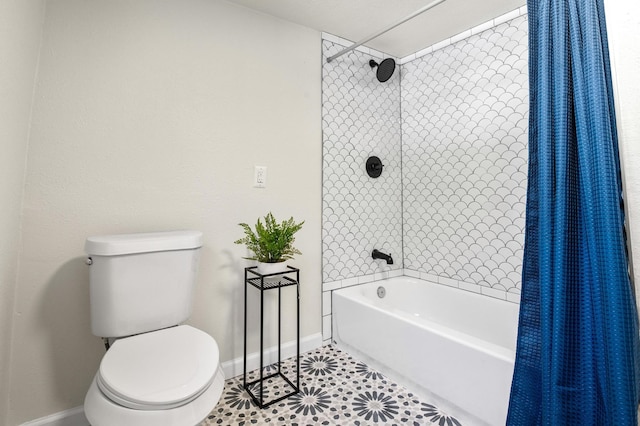 bathroom featuring tile patterned flooring, toilet, and shower / bathtub combination with curtain