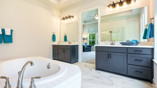 bathroom with ceiling fan, vanity, and plus walk in shower