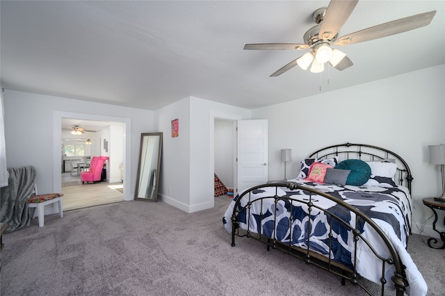 bedroom featuring carpet and ceiling fan