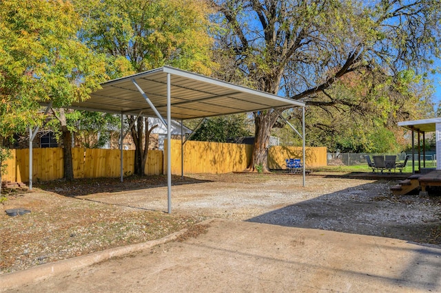 view of car parking with a carport