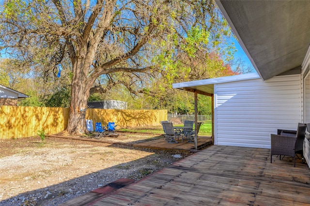 view of patio / terrace featuring a wooden deck