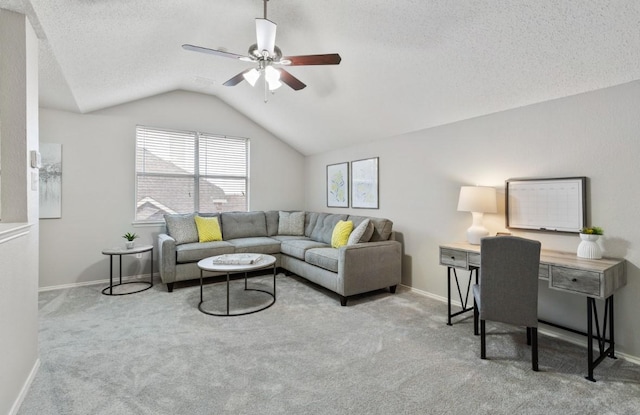 carpeted living room with lofted ceiling, a textured ceiling, and ceiling fan