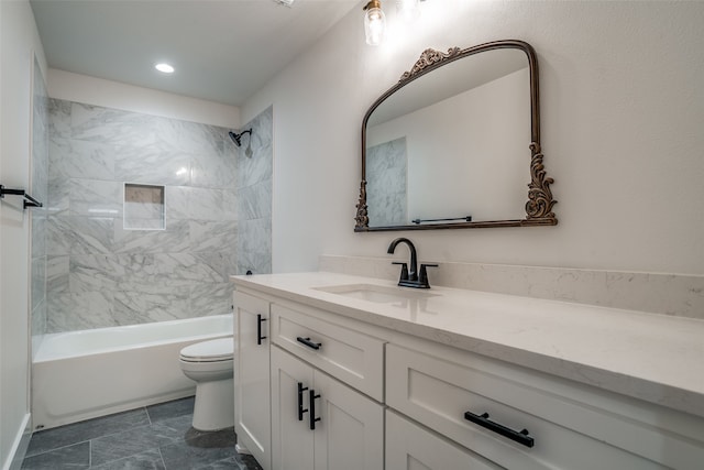 full bathroom featuring vanity, toilet, and tiled shower / bath combo