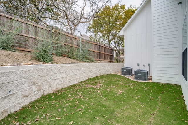 view of yard featuring central AC