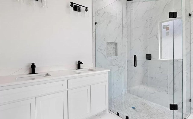 bathroom featuring vanity and walk in shower