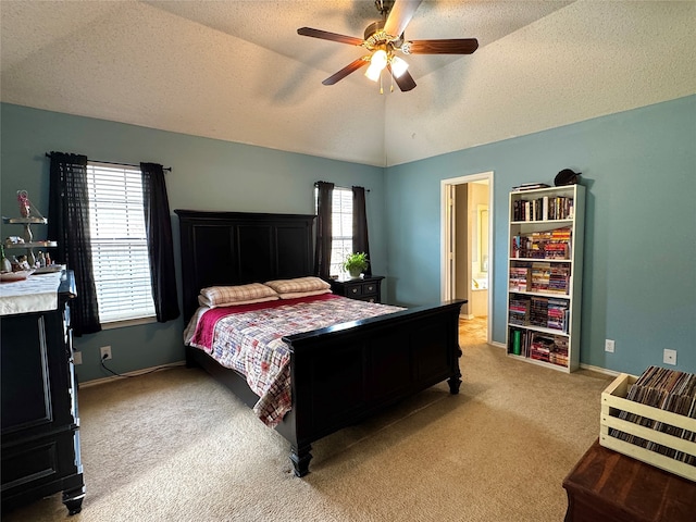 bedroom featuring ceiling fan, vaulted ceiling, light carpet, and multiple windows