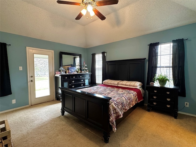 carpeted bedroom with a textured ceiling, access to outside, vaulted ceiling, and ceiling fan