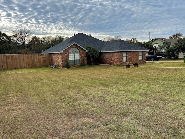 view of front of house with a front lawn