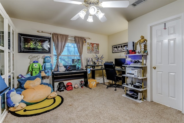 office area with carpet and ceiling fan