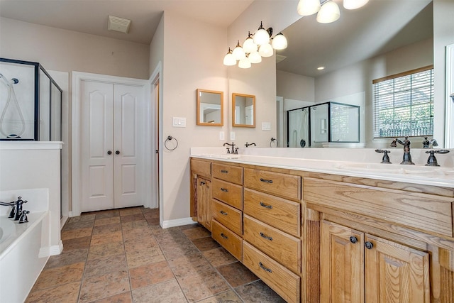 bathroom featuring vanity and separate shower and tub