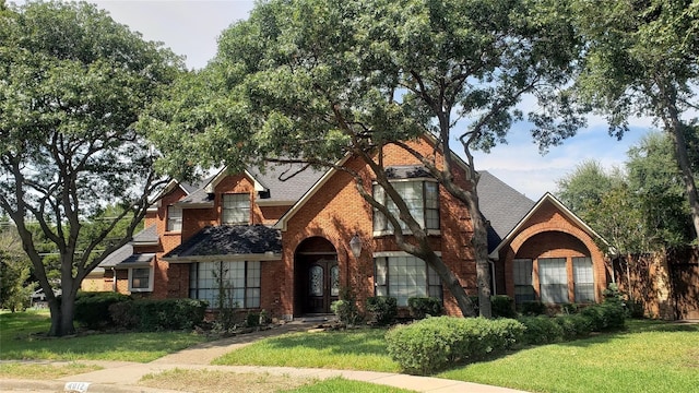 view of front of house with a front lawn