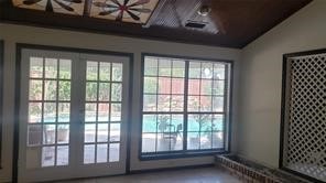 entryway with vaulted ceiling and plenty of natural light