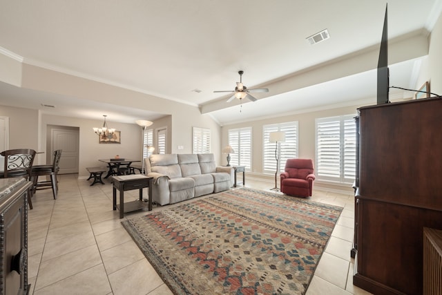 tiled living room featuring ceiling fan with notable chandelier, ornamental molding, and lofted ceiling