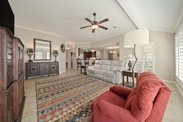 living room featuring crown molding, beamed ceiling, light tile patterned flooring, and ceiling fan with notable chandelier