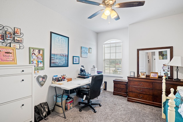 carpeted office with ceiling fan