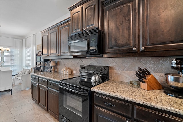 kitchen featuring black appliances, dark brown cabinets, decorative backsplash, and light tile patterned floors