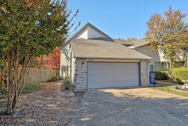 view of front of property featuring a garage