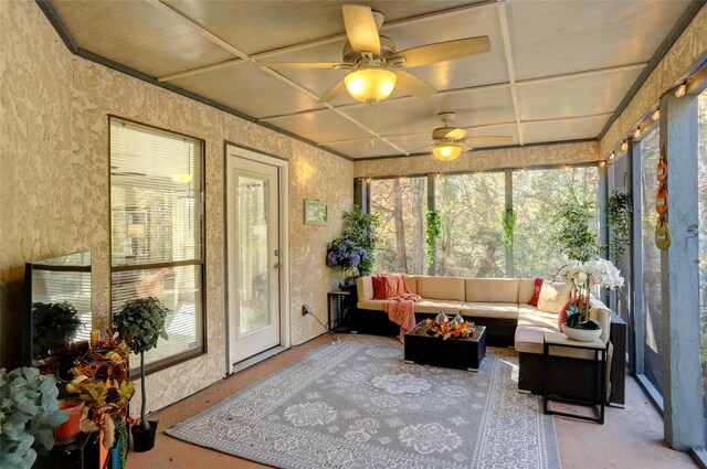 sunroom / solarium featuring ceiling fan and coffered ceiling