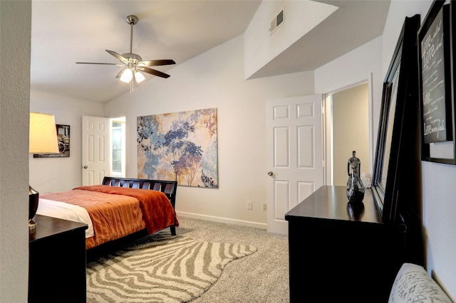 carpeted bedroom with ceiling fan and lofted ceiling